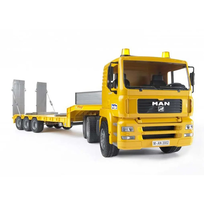 Camion de transport man avec plateforme et mini pelleteuse Caterpillar 