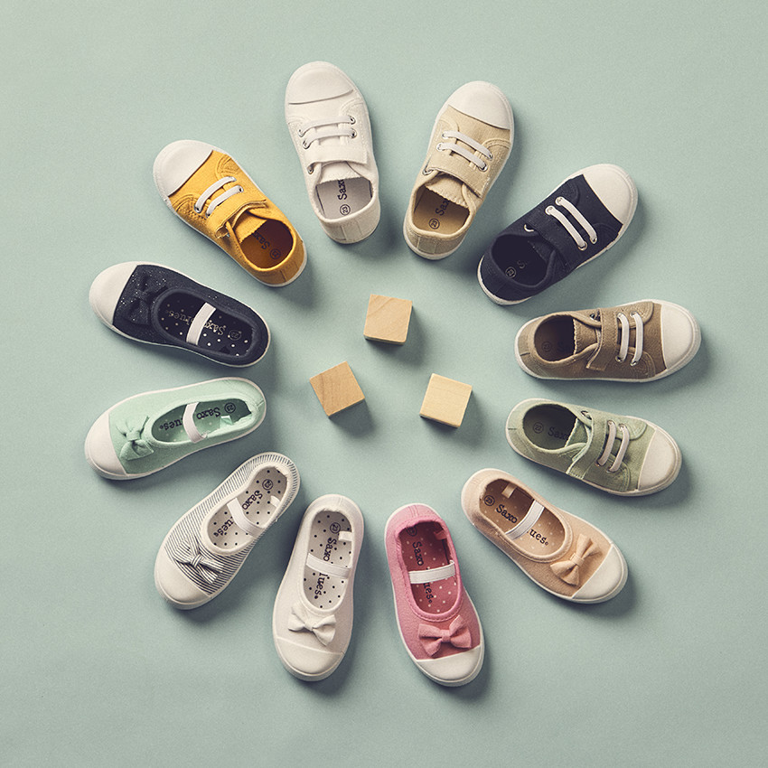 Babies turquoise van stof met een strik en elastische band voor meisjes 