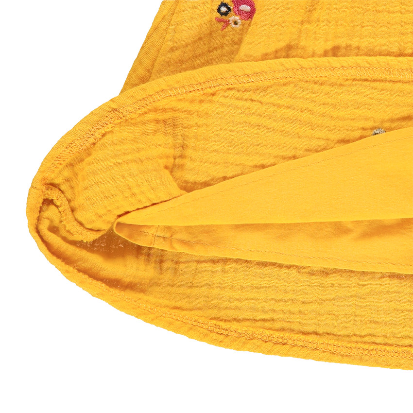 Gele rok met bloemen voor meisjes. 