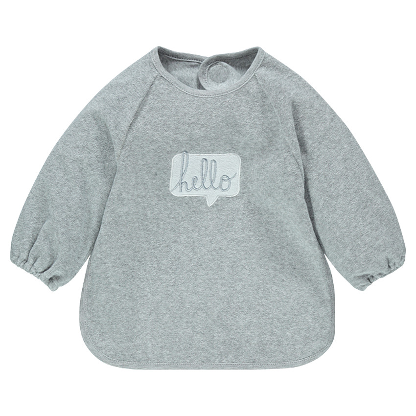 Bavoir manches longues doublé PVC avec motif brodé 