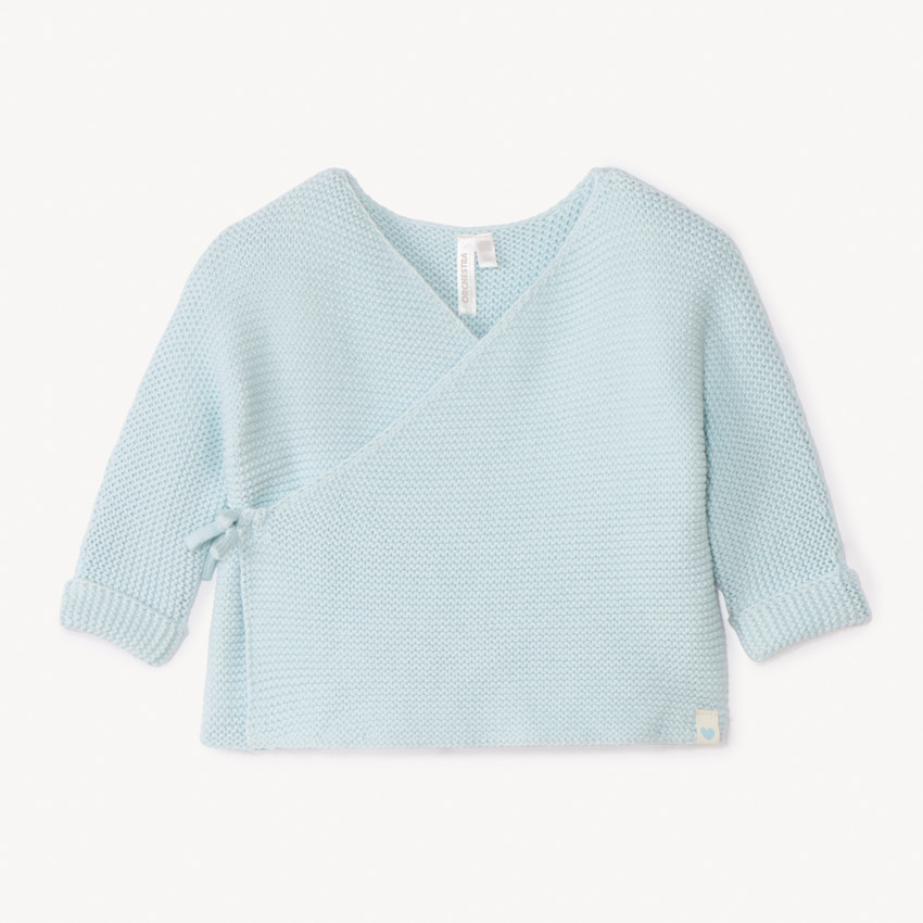 Effen tricot babybustier in mousse ste stitch. 