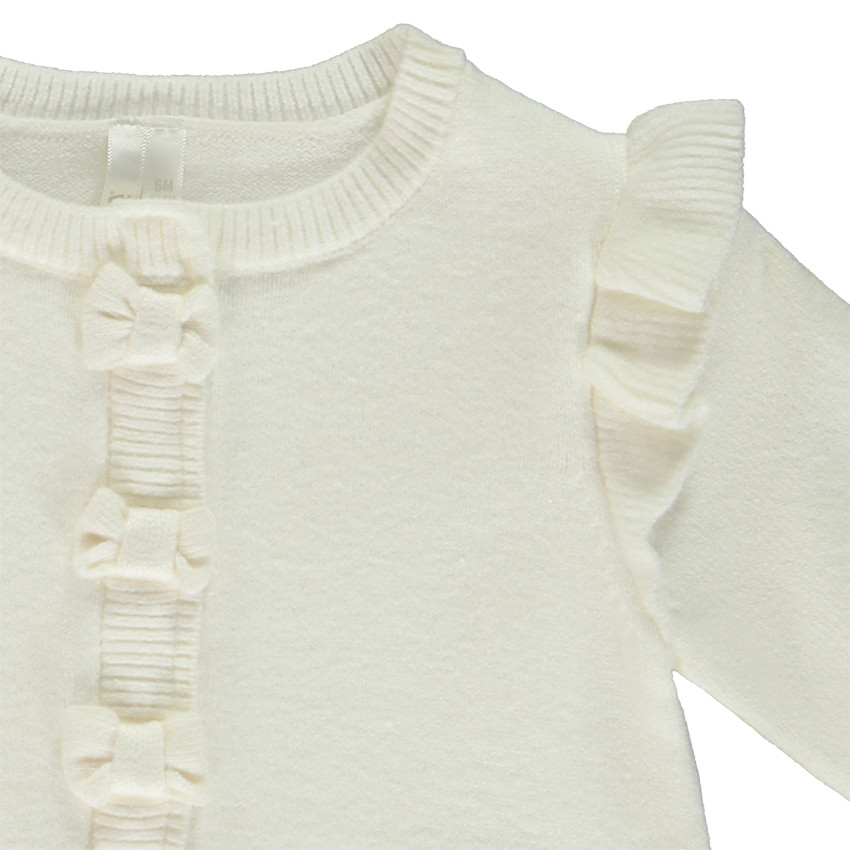 Gebreid effen vest met ruches en fantasieknoop voor baby meisje 