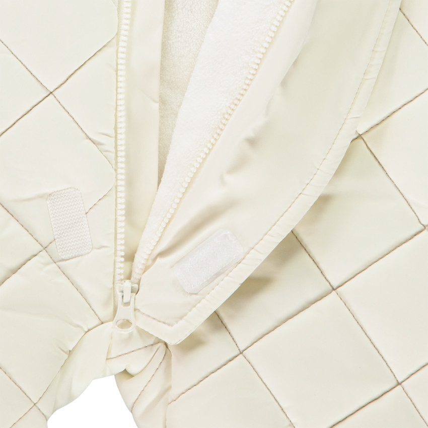 Combi-pilote matelassée à carreaux pour bébé avec finitions différentes selon l'âge 