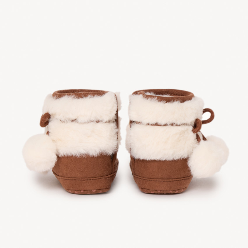 Bottines avec fausse fourrure et pompons pour bébé fille 