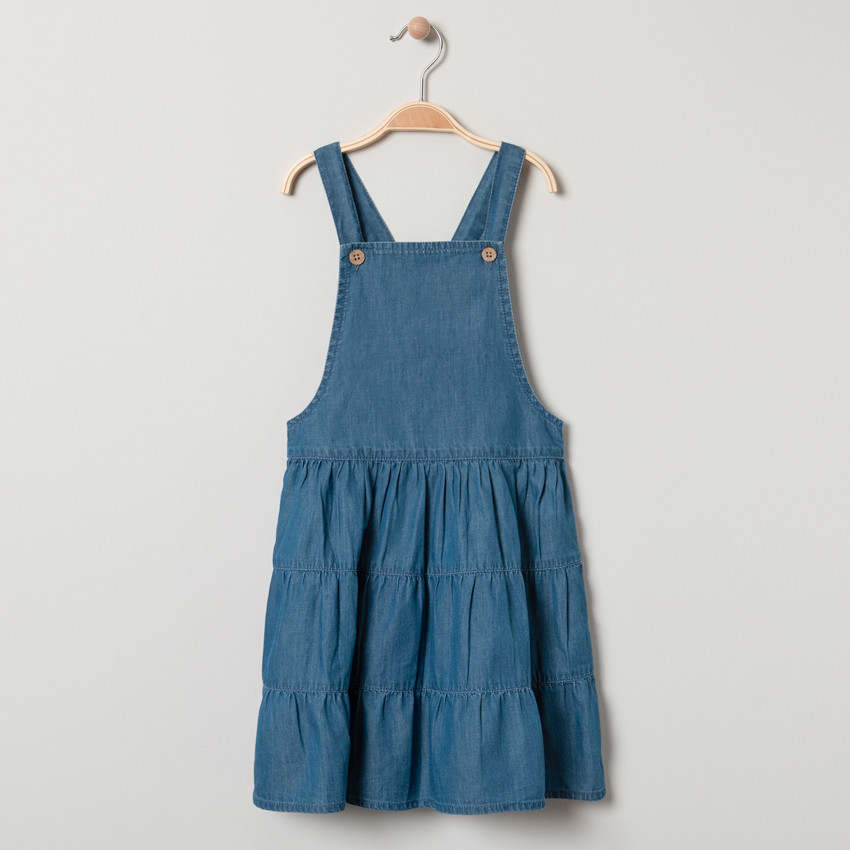 Losse salopettejurk met gekruiste bretellen 