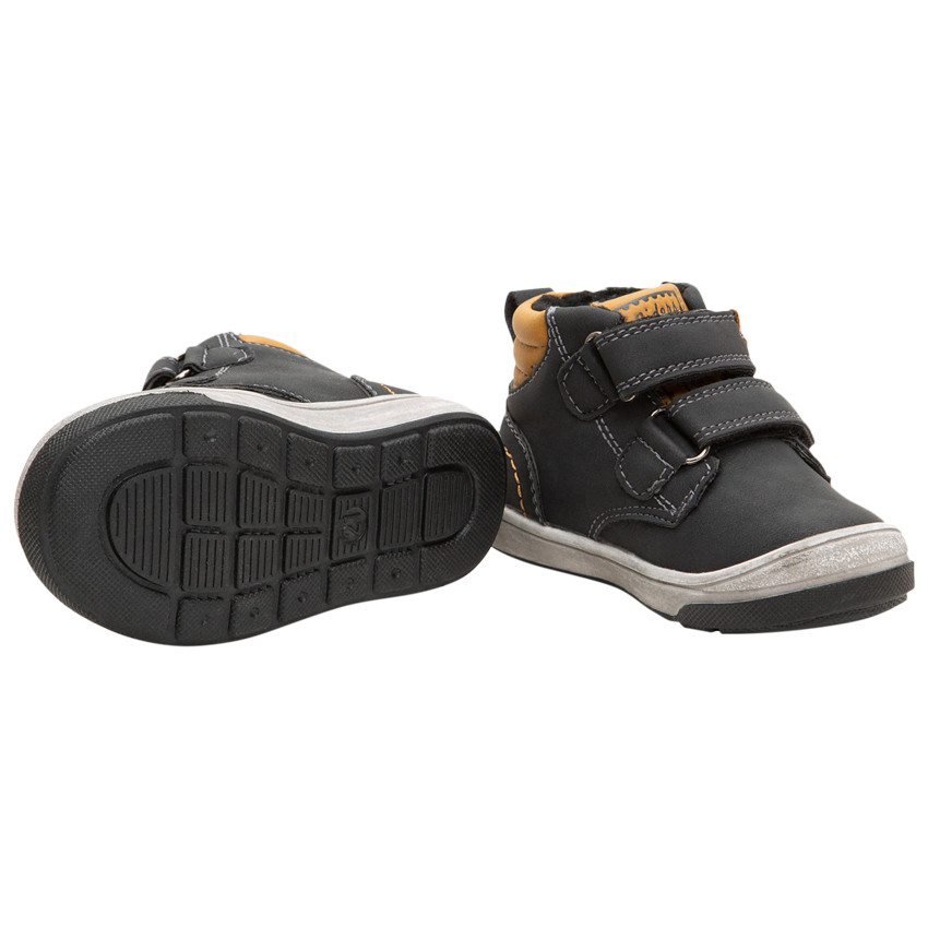 Laarsjes met ledereffect, klittenbandsluiting en contrasterende rand 