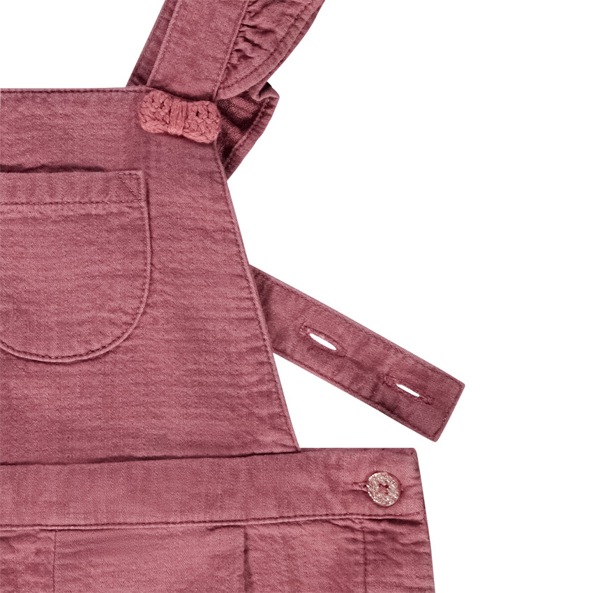 Korte gebreide salopette met knopen voor babymeisjes 