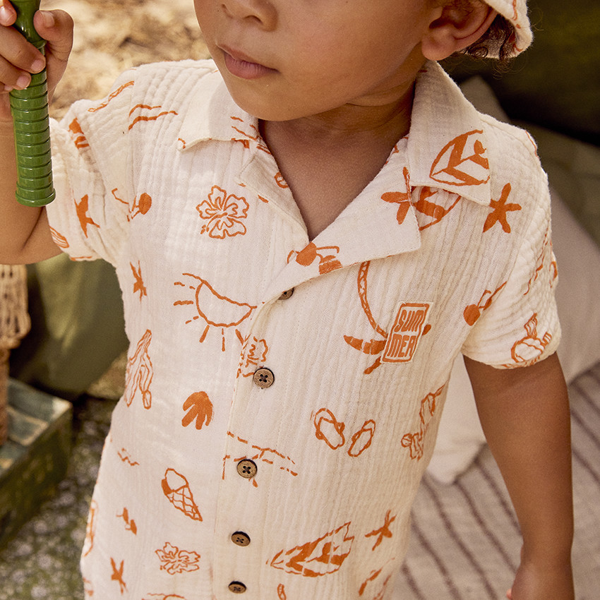 Combinaison courte en tetra imprimé vacances pour bébé garçon 