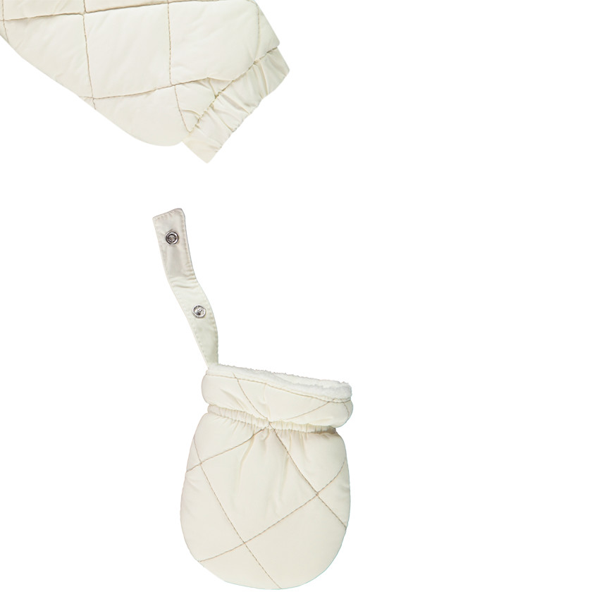 Combi-pilote matelassée à carreaux pour bébé avec finitions différentes selon l'âge 