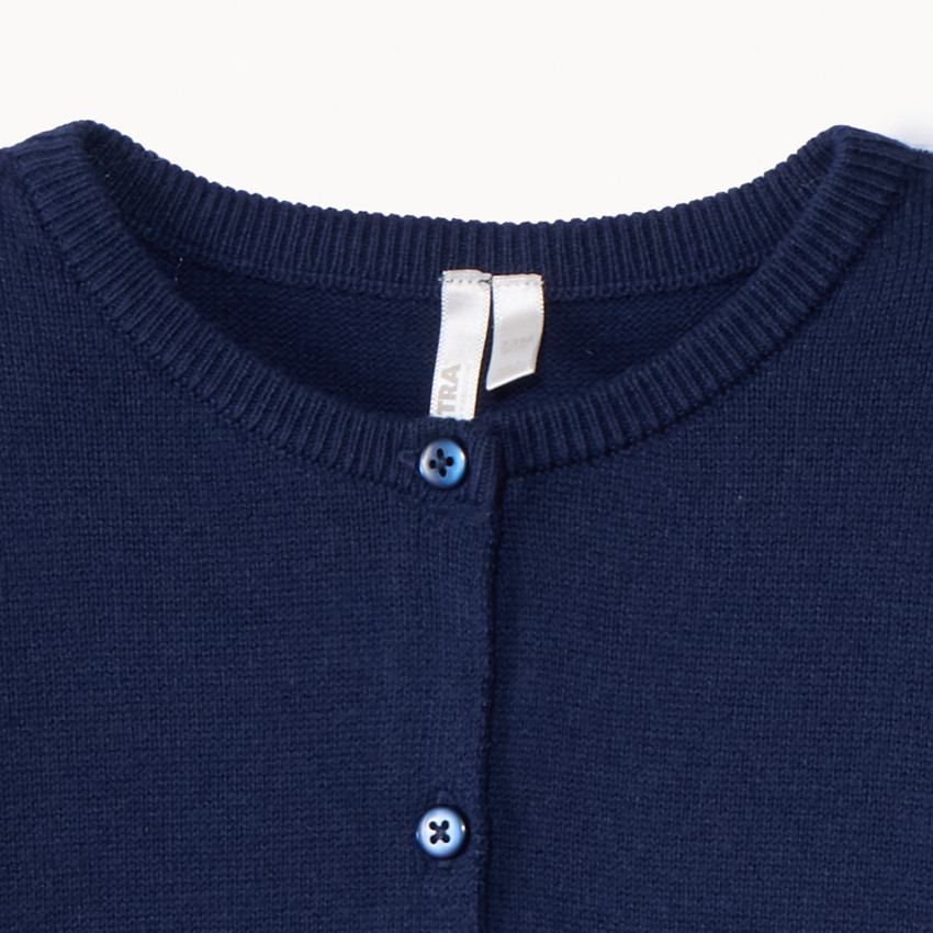 Gilet en tricot uni festonné pour bébé fille 