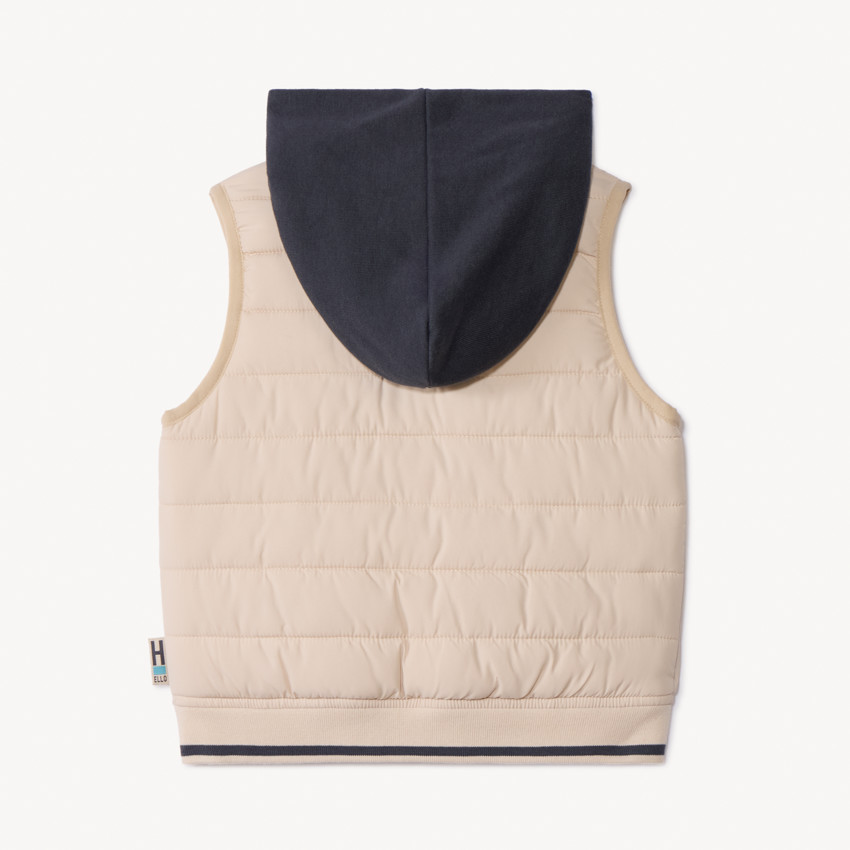 Mouwloze speelse donsjas in twee materialen voor babyjongens 