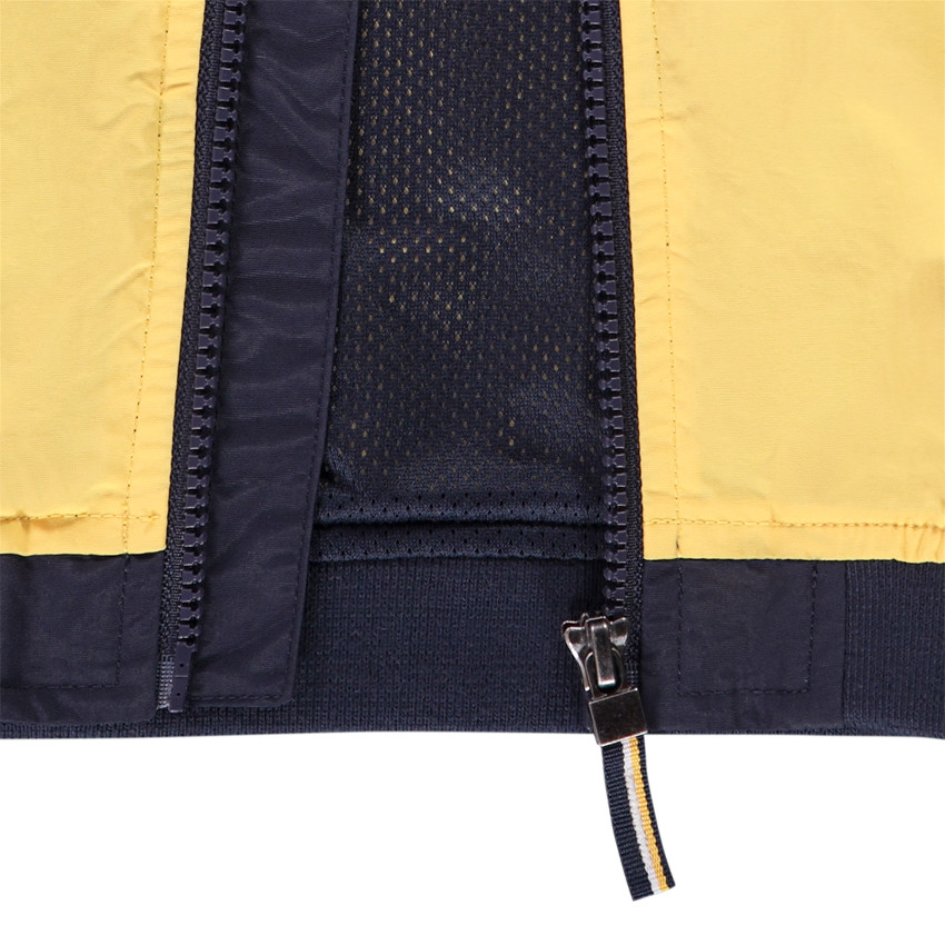 Windjack met capuchon in nylon twill effect colorblock en mesh voering voor baby jongen 