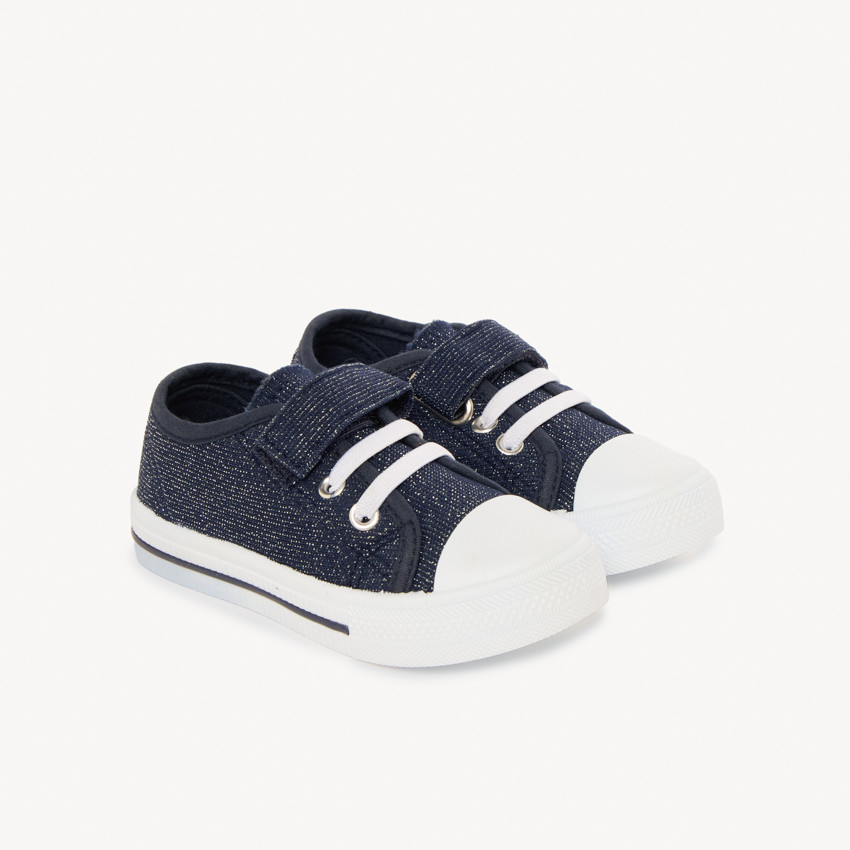 Lage sneakers in marineblauw met klittenband en elastieken voor baby meisjes. 