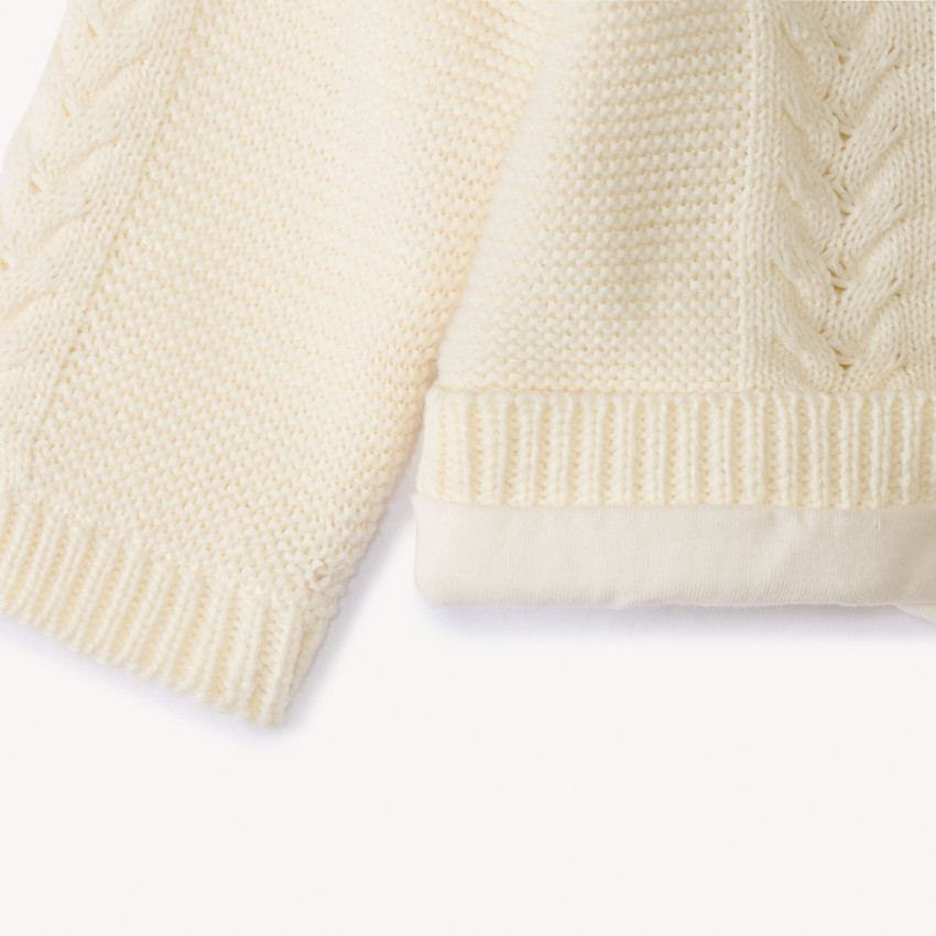 Gilet en tricot torsadé et doublé jersey pour bébé 