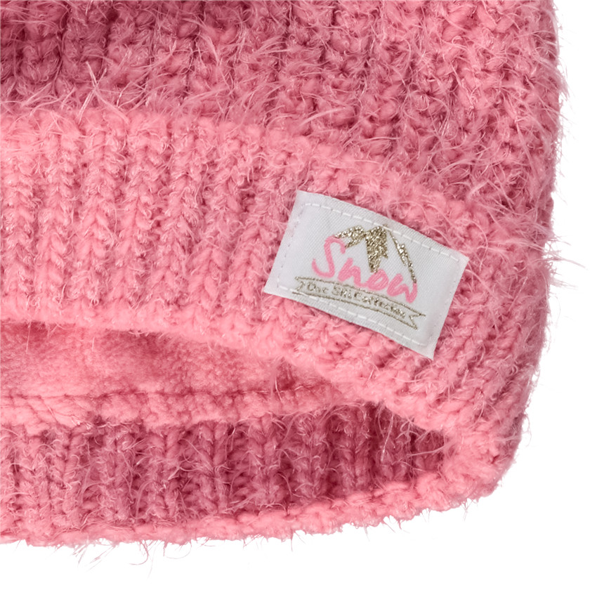 Muts met pompon voor meisjes 