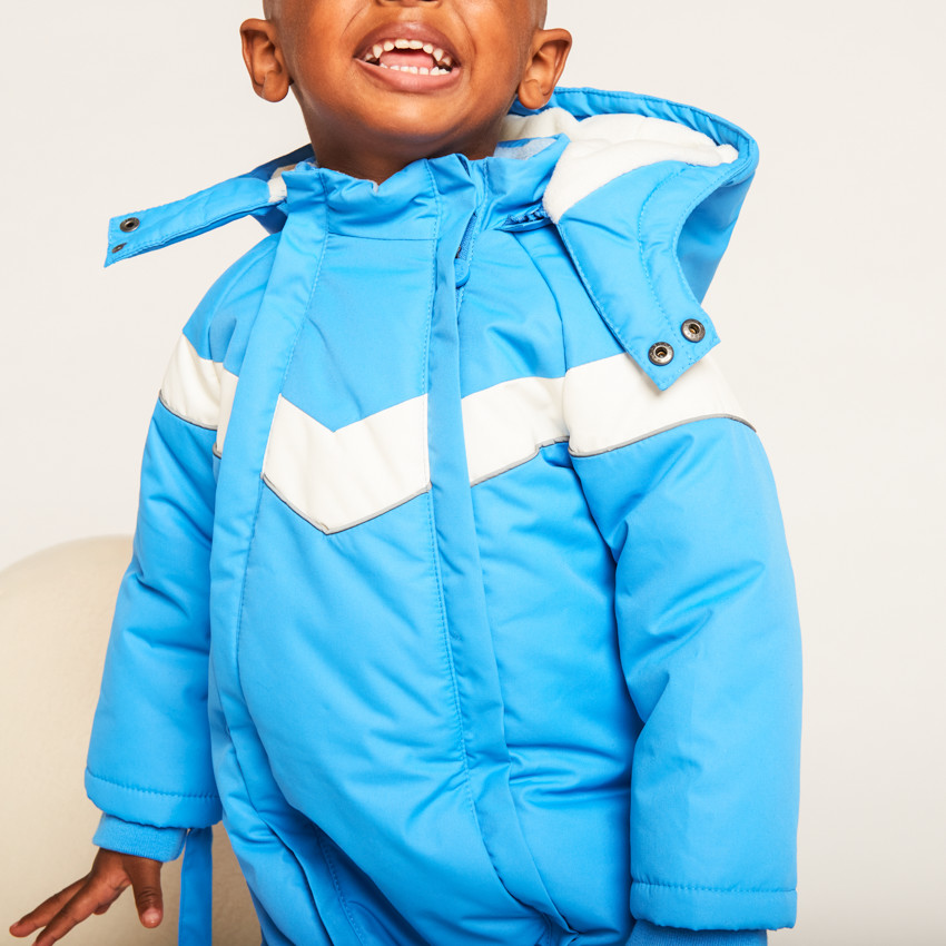 Pilotenpak skipak voor babyjongens met verschillende afwerkingen per leeftijdsgroep 