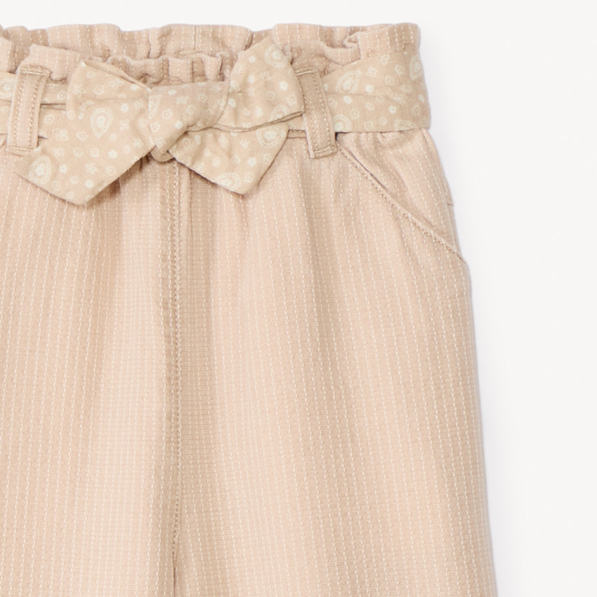 Lange broek met strikceintuur voor meisjes. 