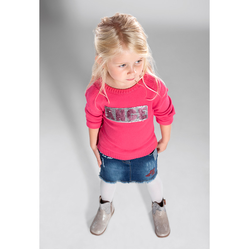 Pull en tricot avec message en sequins magiques 