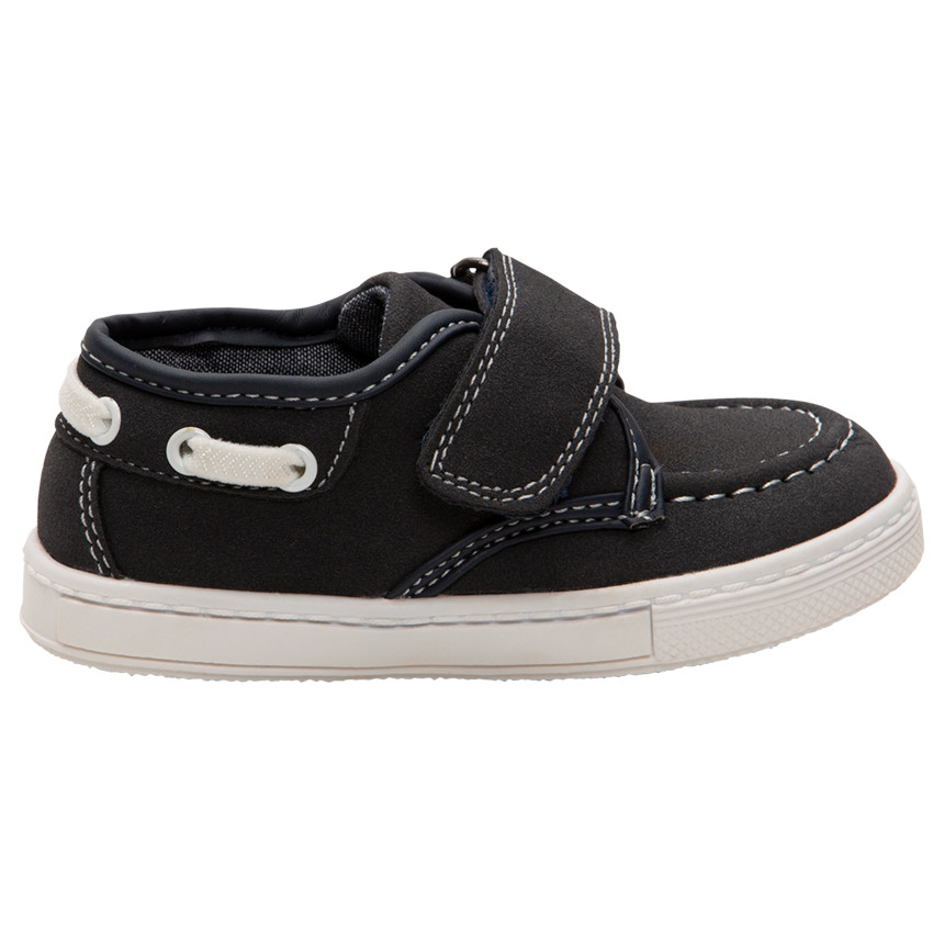 Bootschoenen met klittenband en sierveters aan de kraag 